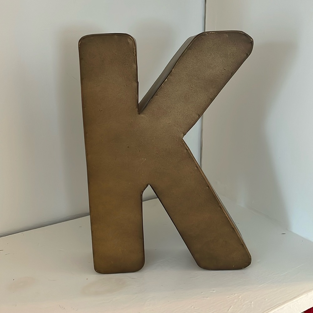 Metal “K” decoration